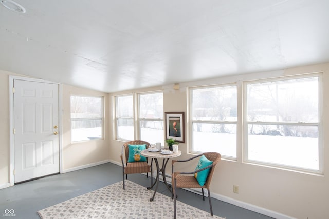 sunroom with vaulted ceiling