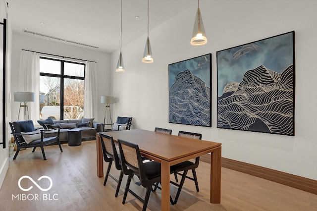 dining room with light hardwood / wood-style floors