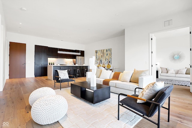 living room with light wood-type flooring