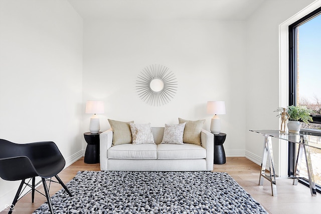 living room with light hardwood / wood-style flooring