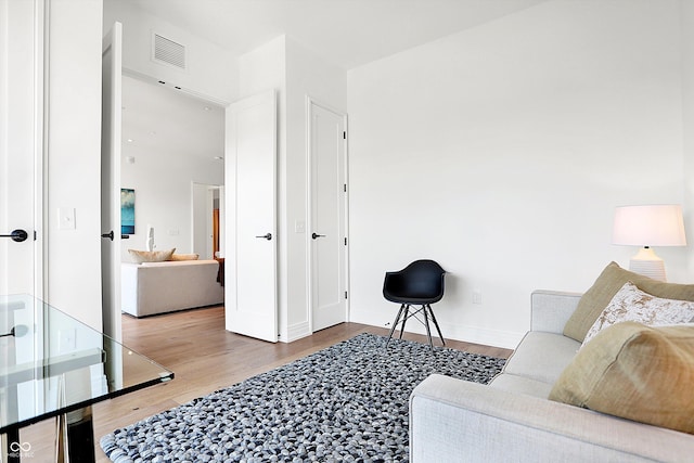 living room featuring wood-type flooring