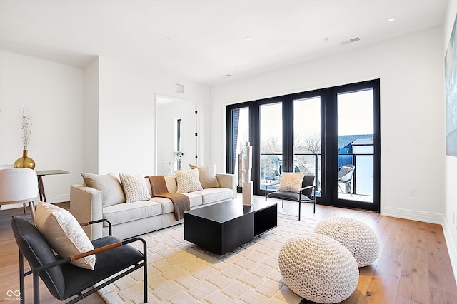 living room featuring light wood-type flooring