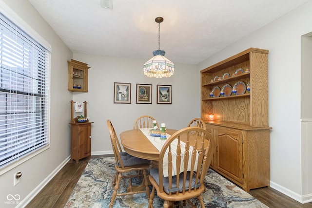 dining room featuring dark hardwood / wood-style floors