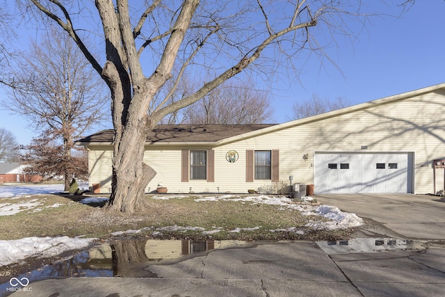 single story home with a garage