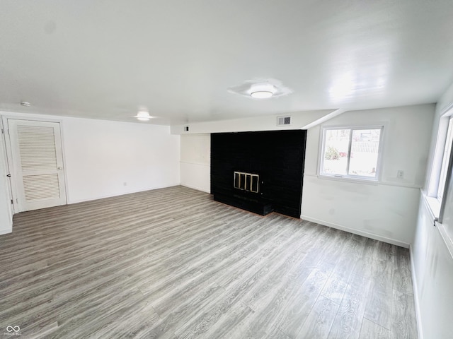 unfurnished room featuring light hardwood / wood-style floors