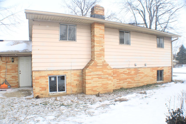 view of snow covered property