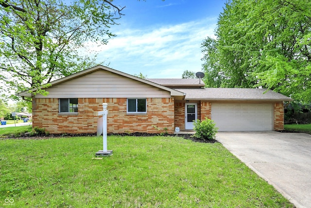 9157 Neptune Dr, Indianapolis, IN 46229 - ranch-style house featuring an attached garage, driveway, a front yard, and brick siding