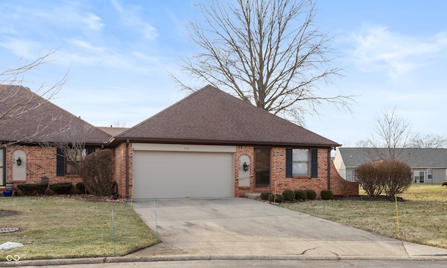 view of front facade with a garage and a front yard