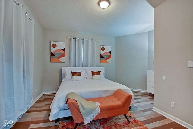 bedroom featuring light hardwood / wood-style floors