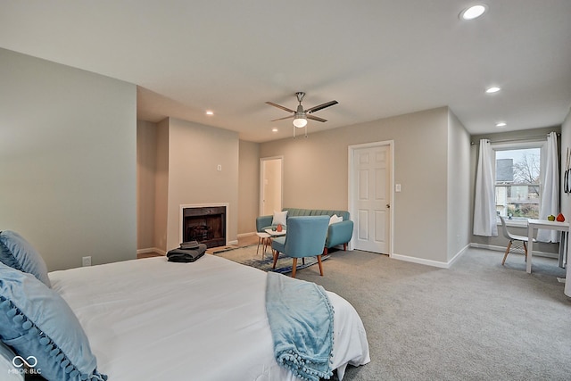 carpeted bedroom with ceiling fan