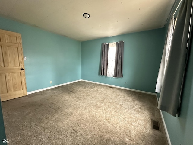 7903 Roseway Ct, Indianapolis, IN 46226 - carpeted empty room featuring visible vents and baseboards