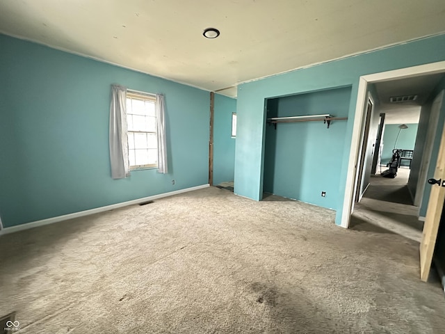 7903 Roseway Ct, Indianapolis, IN 46226 - unfurnished bedroom featuring a closet, carpet flooring, and visible vents