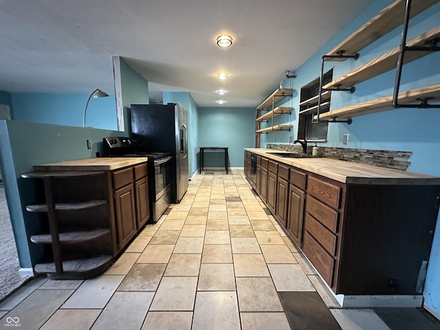 7903 Roseway Ct, Indianapolis, IN 46226 - kitchen with open shelves, dark brown cabinetry, light tile patterned flooring, black appliances, and a sink