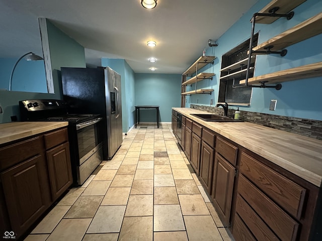 7903 Roseway Ct, Indianapolis, IN 46226 - kitchen with a sink, dark brown cabinetry, butcher block countertops, electric range oven, and open shelves