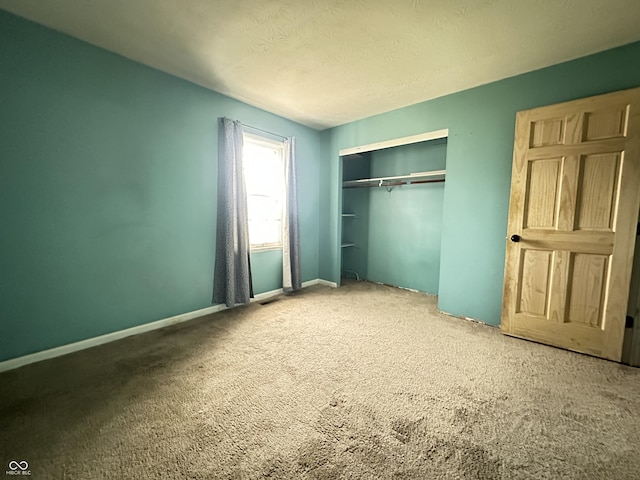 7903 Roseway Ct, Indianapolis, IN 46226 - unfurnished bedroom featuring a closet and a textured ceiling