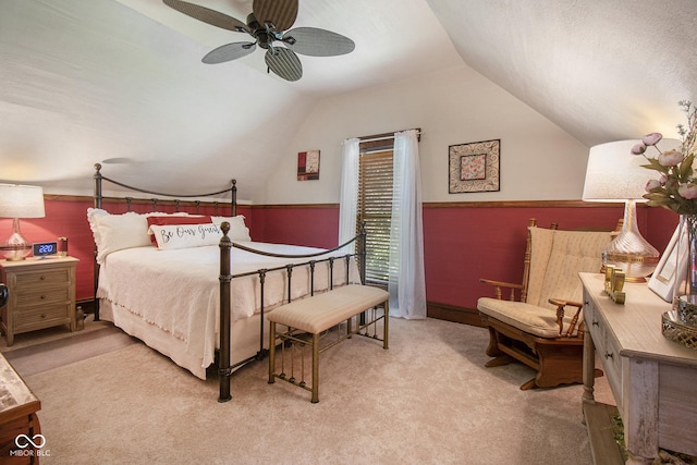 carpeted bedroom with lofted ceiling and ceiling fan