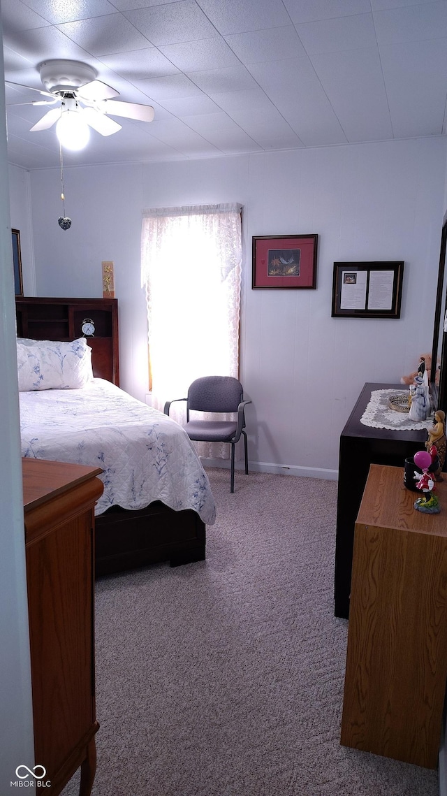 bedroom featuring carpet flooring and ceiling fan