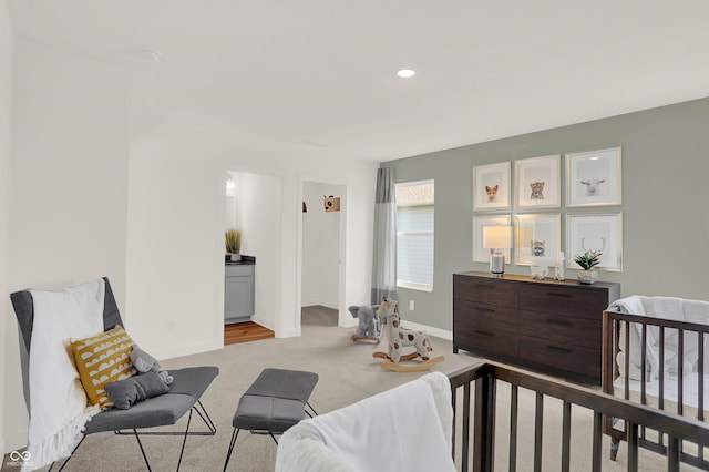 carpeted bedroom featuring connected bathroom