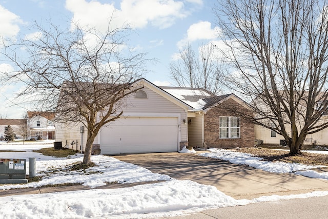 ranch-style house featuring a garage