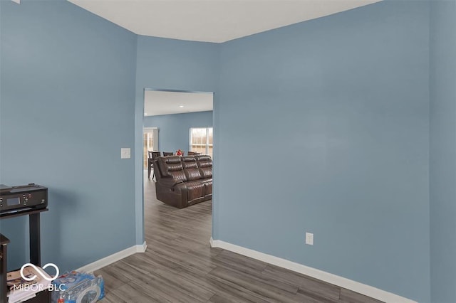 unfurnished room featuring wood-type flooring