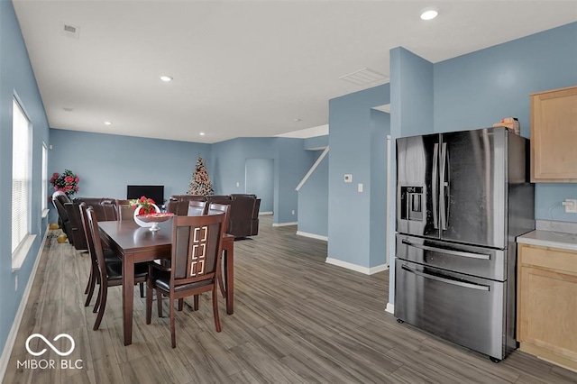 dining area featuring wood-type flooring