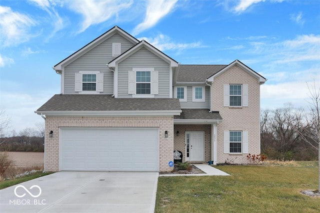 front facade featuring a garage and a front lawn