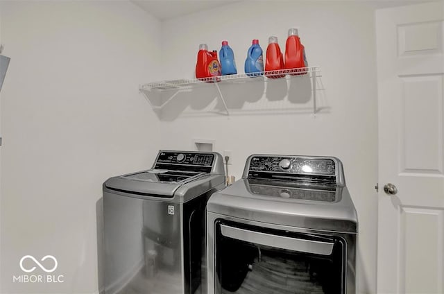 laundry area featuring separate washer and dryer