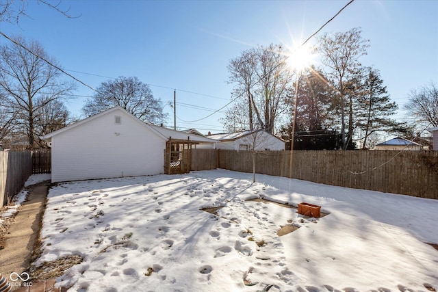 view of yard covered in snow