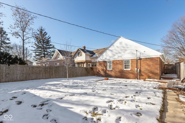 view of snow covered property