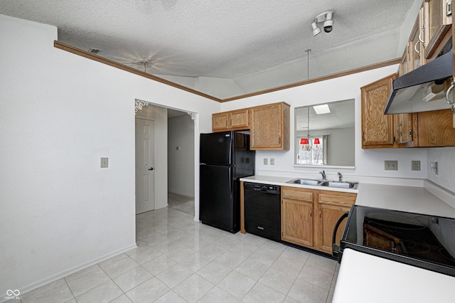 kitchen featuring pendant lighting, sink, a textured ceiling, black appliances, and lofted ceiling