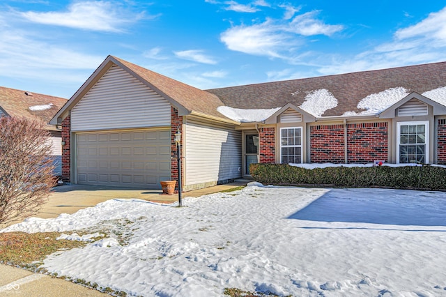 ranch-style home with a garage