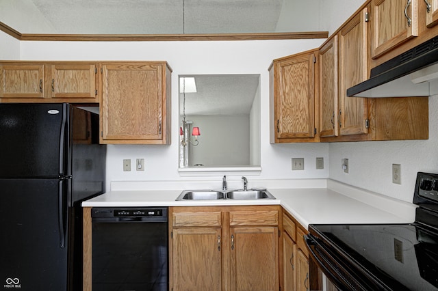 kitchen featuring sink, a textured ceiling, and black appliances