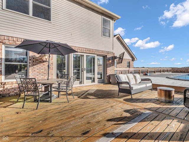 deck featuring an outdoor hangout area