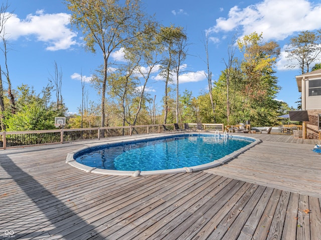 view of pool featuring a deck