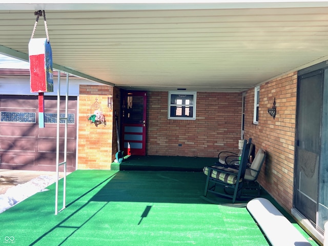 view of patio / terrace featuring a carport