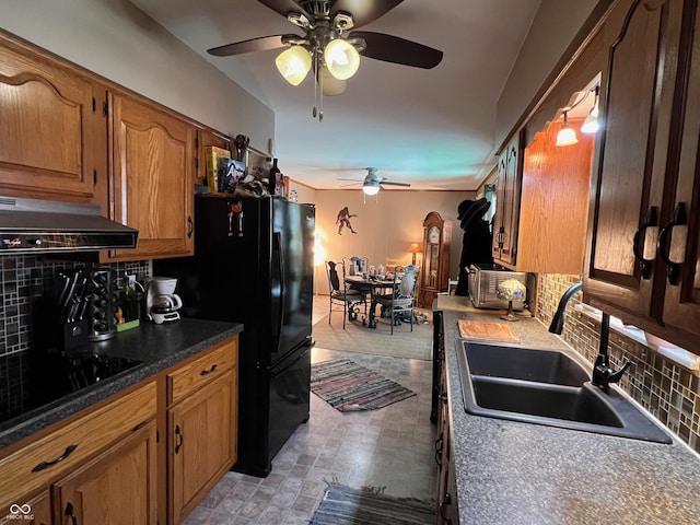 kitchen featuring premium range hood, sink, black appliances, ceiling fan, and backsplash