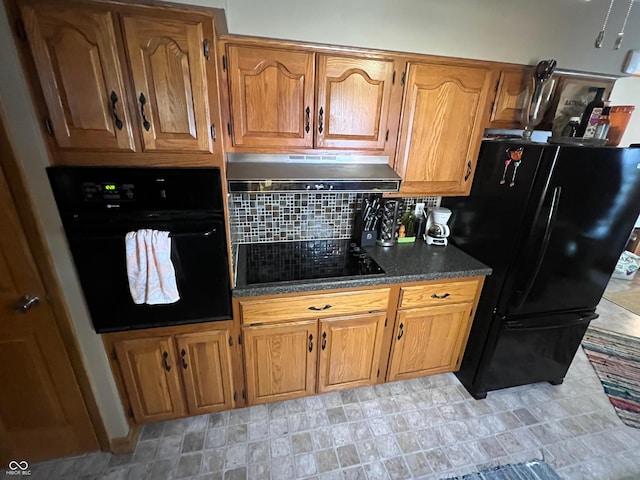 kitchen with decorative backsplash and black appliances