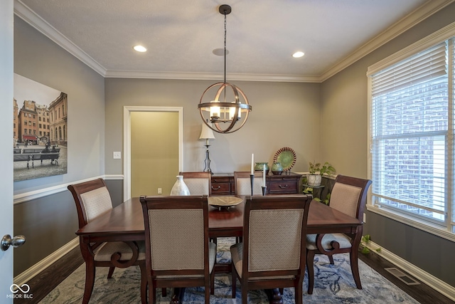 dining space featuring crown molding and dark hardwood / wood-style flooring