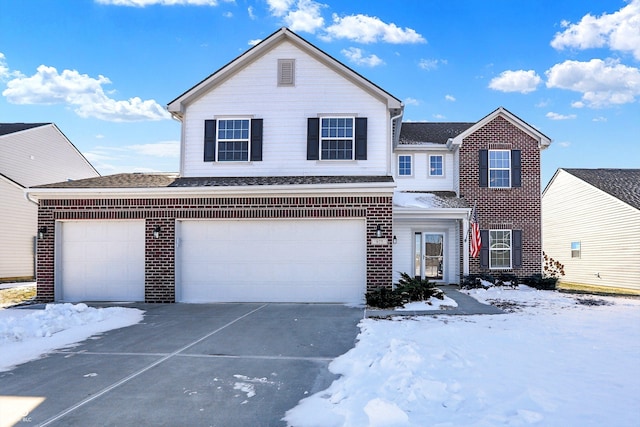 front of property featuring a garage