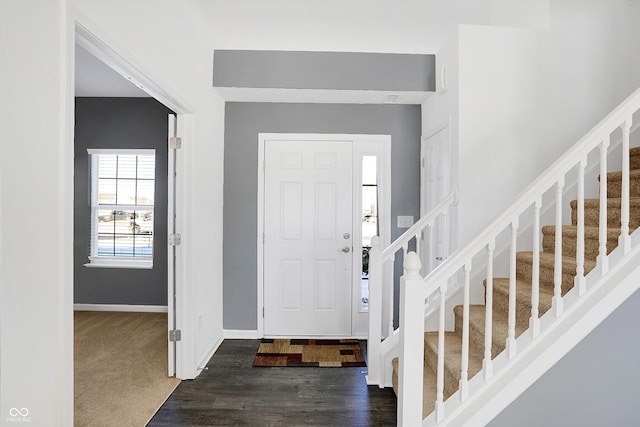 view of carpeted foyer