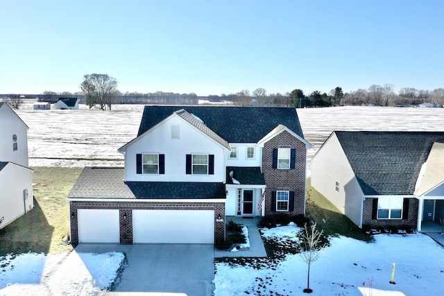 view of front of home featuring a garage