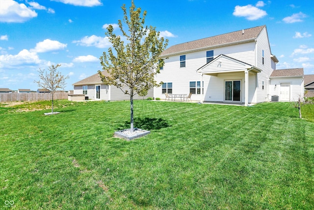 977 Capricorn Dr, Franklin, IN 46131 - back of property with a yard, central air condition unit, and fence