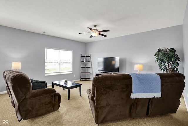 977 Capricorn Dr, Franklin, IN 46131 - living area with light carpet, baseboards, and a ceiling fan