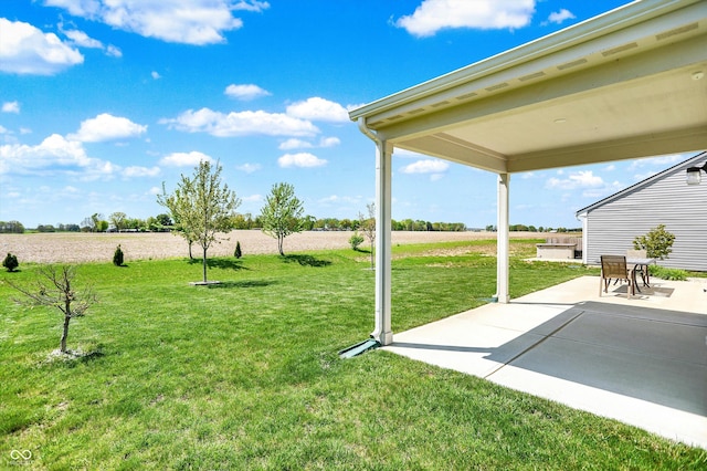 977 Capricorn Dr, Franklin, IN 46131 - view of yard featuring a patio and a rural view