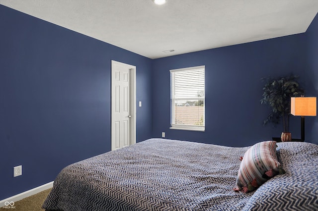 977 Capricorn Dr, Franklin, IN 46131 - bedroom featuring baseboards, visible vents, and carpet floors