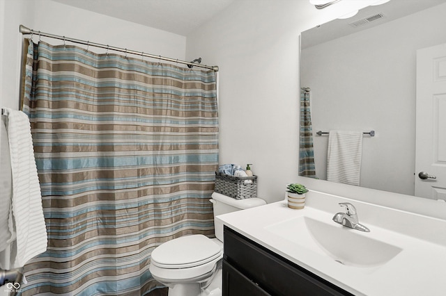 977 Capricorn Dr, Franklin, IN 46131 - full bathroom featuring vanity, toilet, a shower with curtain, and visible vents