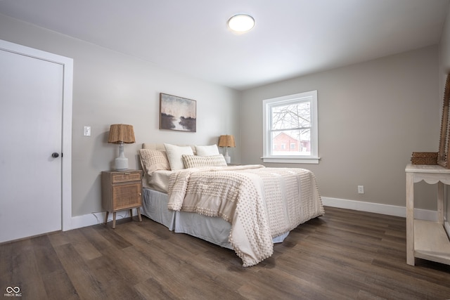 bedroom featuring dark hardwood / wood-style floors