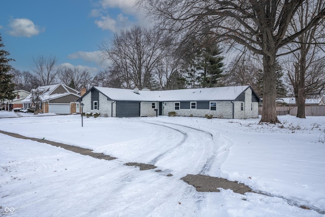 ranch-style house with a garage