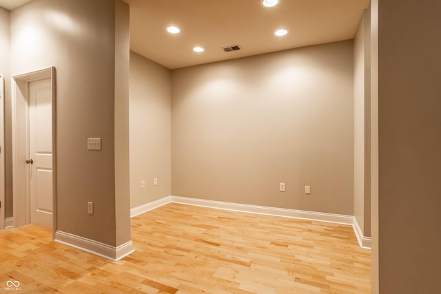 spare room with light hardwood / wood-style flooring