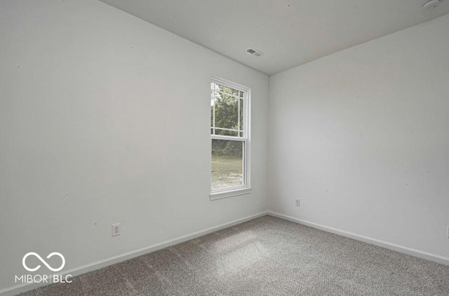 view of carpeted spare room